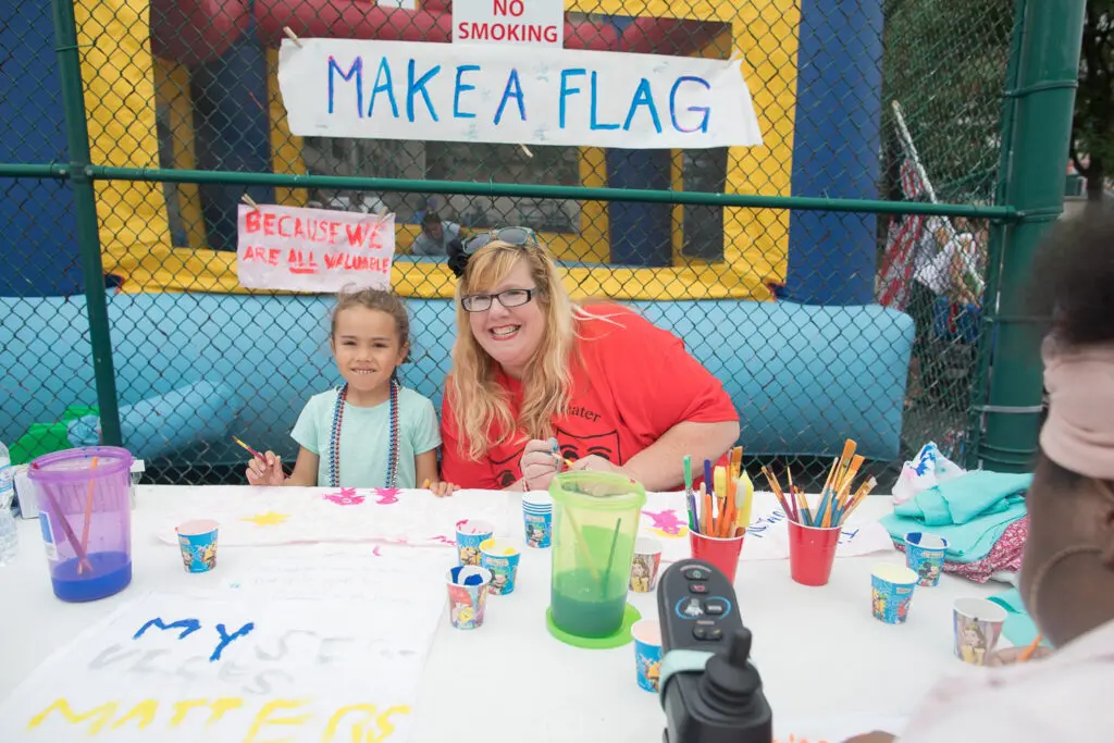 Flag-making arts and crafts for the disability parade