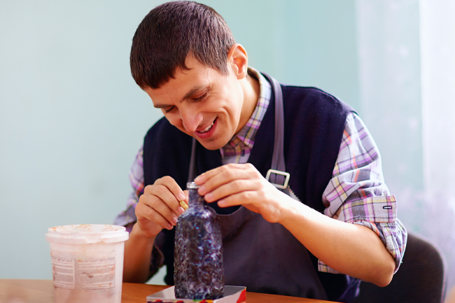 Man working on an arts and craft project
